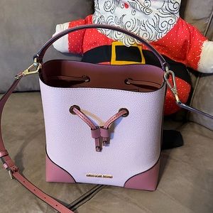 Micheal Kors .. pink small bucket bag.